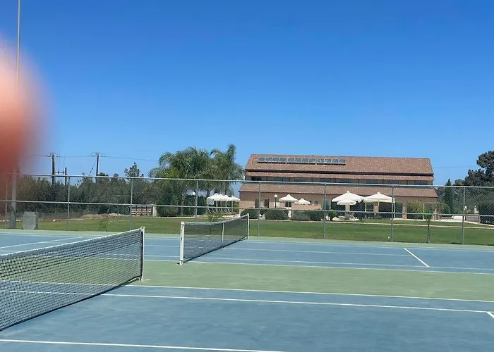 Tennis And Country Club *